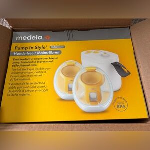 Medela Double Electric Breast Pump in Yellow and White